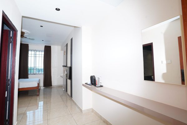 Corporate Meeting Hall in ECR Road, Ramanathapuram with spacious AC conference hall, professional seating arrangements, modern interiors, and business facilities at Shree Priyam Palace.