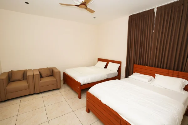 Premium Rooms Near Me in ECR Road, Ramanathapuram with comfortable interiors, modern amenities, clean accommodation, and a relaxing stay experience at Shree Priyam Palace.